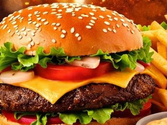 Burger au steak, cheddar fondu, salade et tomate